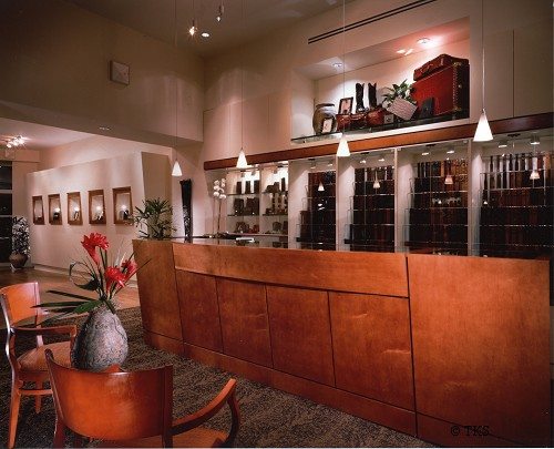 Custom Belt and “Buckle Bar” where customers can select the leather that is hanging on the back wall and their silver or gold buckle that is displayed inside the bar cabinet under glass. This design feature was essential so that customers could not handle the expensive leather and damage it with hand oil or dirt.